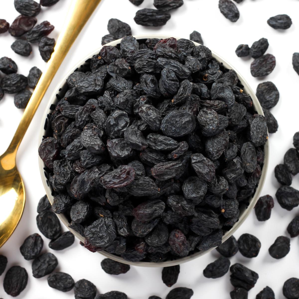 Buy Urban Platter Seedless Black Afghan Raisins, 1Kg Online| Urban Platter